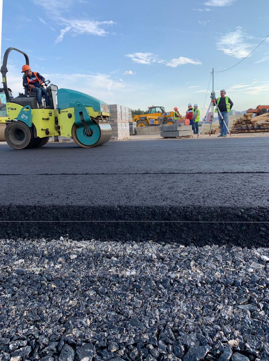 укатка асфальта катком укладка асфальта; асфальтирование; асфальтировка